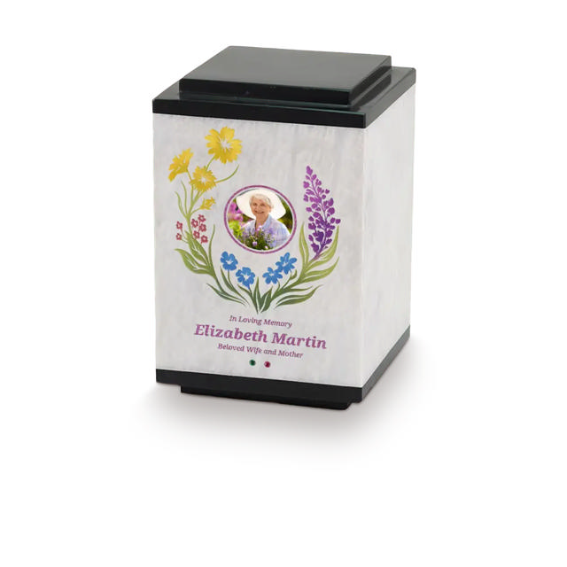 white marble urn with a photo and wildflower design personalized with text