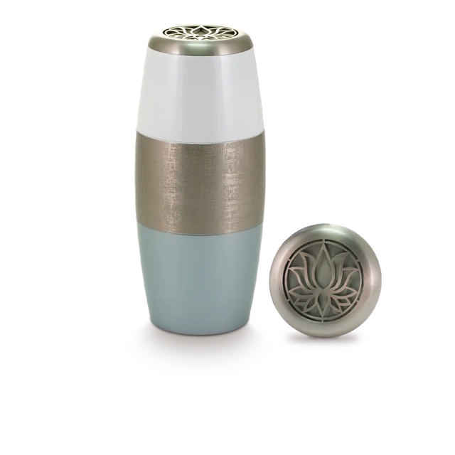 white silver and blue tall urn with a lotus leaf design on the lid