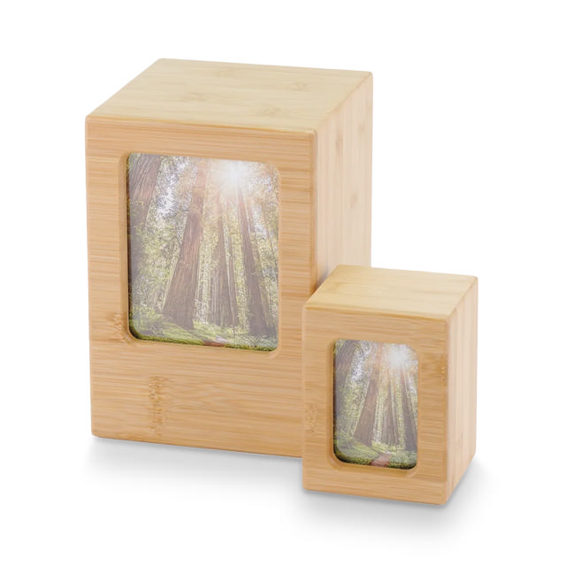 two bamboo urns with photo openings in them